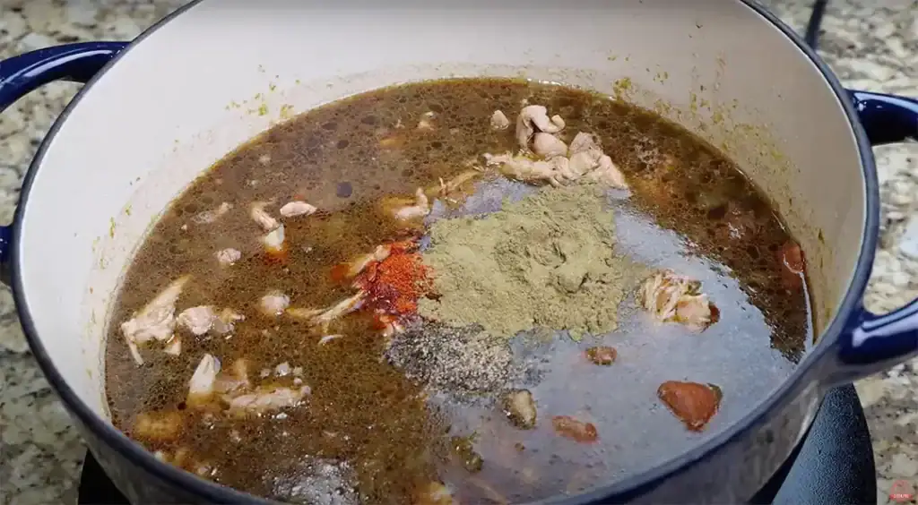 Adding the seasonings for the Chicken and Sausage Gumbo